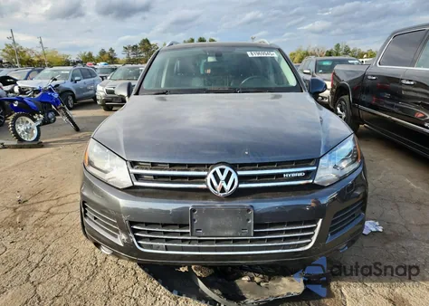2012 Volkswagen Touareg Hybrid from USA, damaged, VIN WVGFG9BP5CD004543